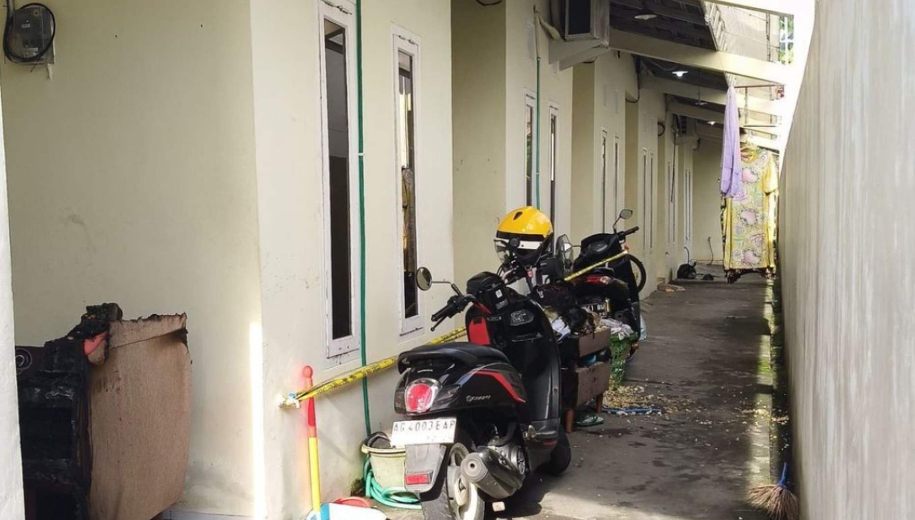 TRAGIS: Rumah kos di Jalan Monginsidi, Kelurahan Payaman, Kabupaten Nganjuk yang menjadi lokasi pembunuhan ibu dan anak.