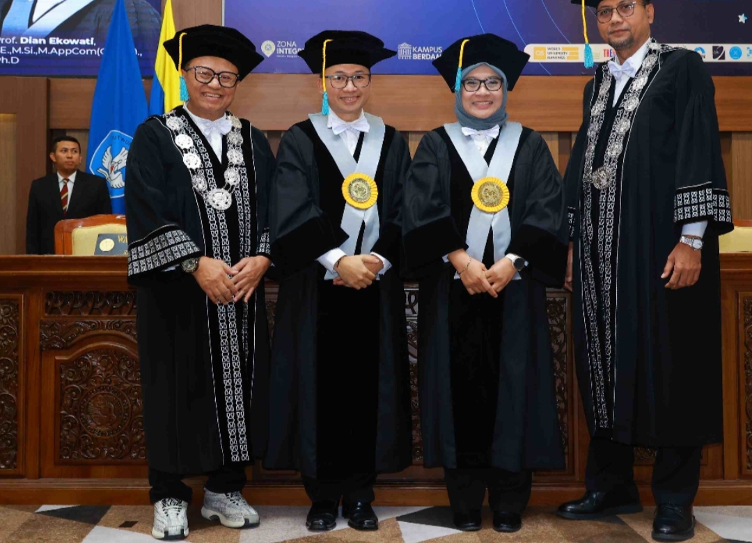 Prof. Dr. Unggul Heriqbaldi, S.E., M.Si., P.Grad.Dip.Ec., M.App.Ec. dan Prof. Dian Ekowati, S.E., M.Si., M.App.Com. (Org.Ch)., Ph.D, dikukuhkan Kamis.