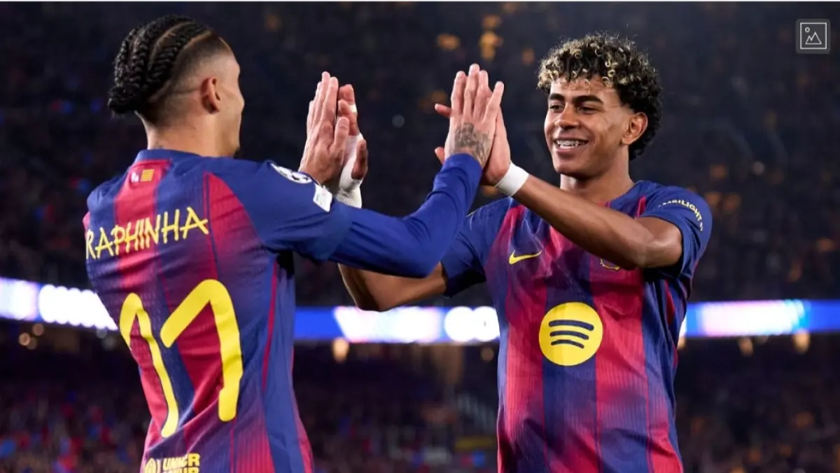 Selebrasi Raphinha dan Lamine Yamal usai cetak gol. 