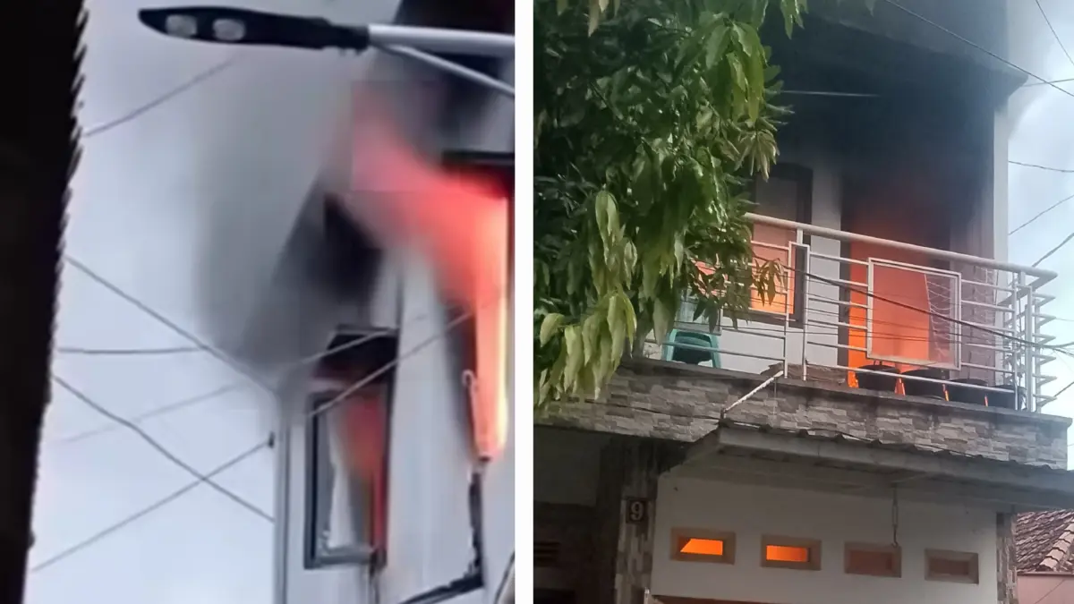 MEMBARA : Api membara membakar kamar di lantai dua rumah Amajah di Jalan Gubeng Jaya II, Surabaya, Kamis (2/4).(IST/RADAR SURABAYA)