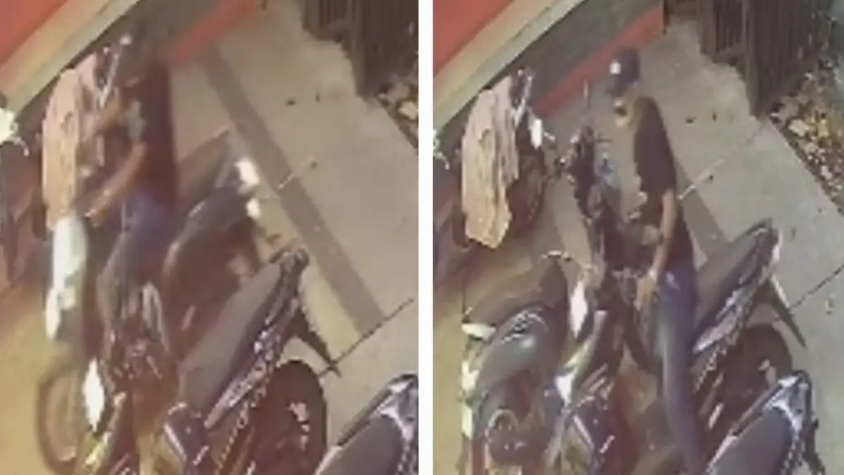 TUKAR MOTOR: Pelaku curanmor saat beraksi di Kedai Es Krim, Jalan Ngagel Jaya, Surabaya. Pelaku meninggalkan motor saran di lokasi.(IST/RADAR SURABAYA)