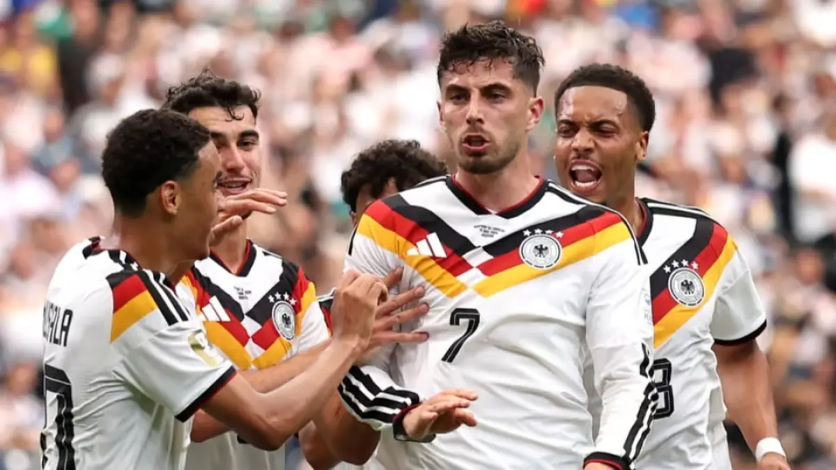 Selebrasi Kai Havertz usai cetak gol ke gawang Curacao. (The Guardian) 