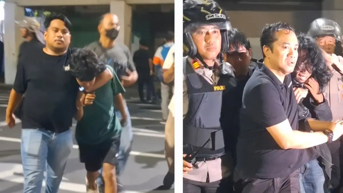 SIGAP: Polisi mengamankan belasan orang usai demo di depan Gedung Grahadi, Surabaya. (GUNTUR IRIANTO/RADAR SURABAYA)