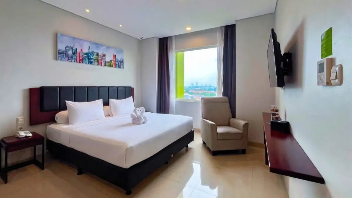 NYAMAN: Pilihan kamar tipe Deluxe Room di PrimeBiz Hotel Surabaya yang memiliki luas yaitu 32 meter persegi.(IST/RADAR SURABAYA)