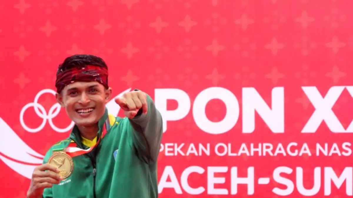 Syarif Hidayatullah, pesilat dari Perguruan Joko Tole Madura peraih medali emas nomor tunggal PON XXI Aceh-Sumut 2024.(KONI Jatim) 