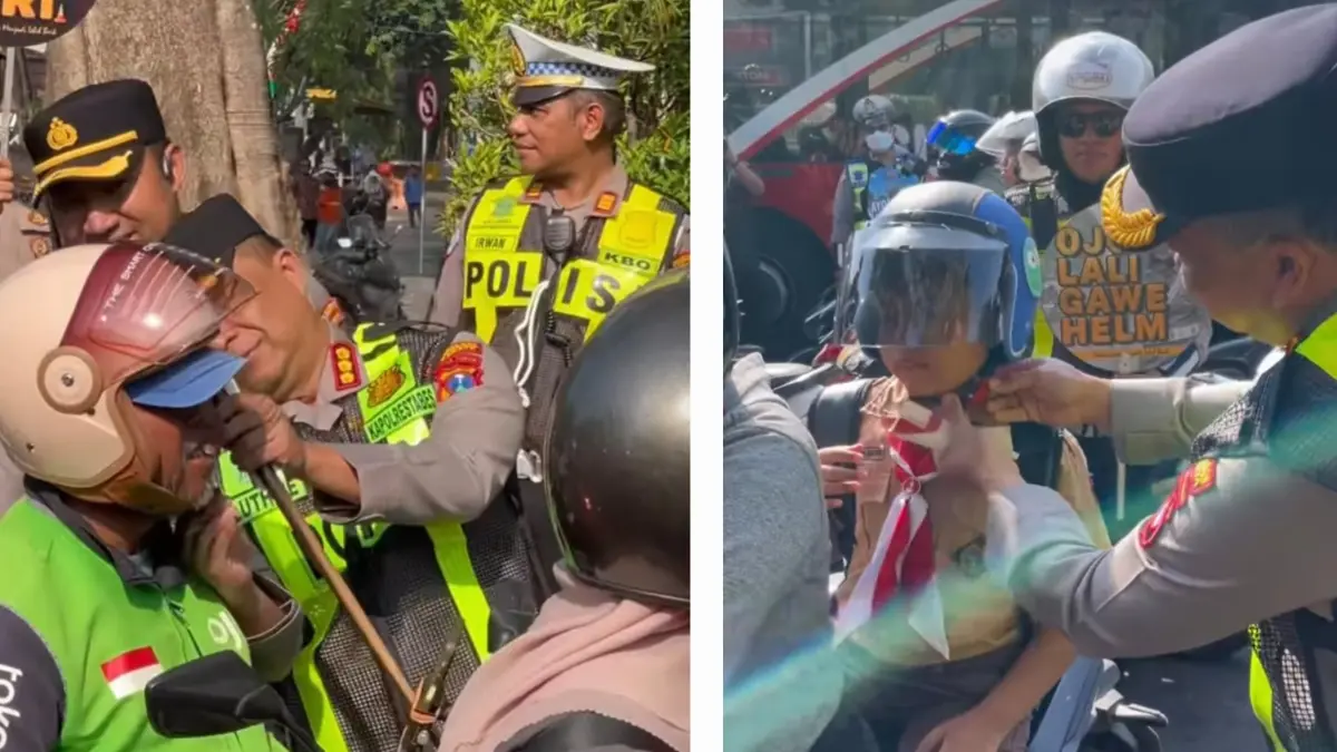 GRATIS: Kapolrestabes Surabaya Kombes Pol Lutfhie Sulistiawan saat membagikan helm ke pengendara yang melintas di Jalan Darmo, Surabaya. (IST/RADAR SURABAYA&nbsp;