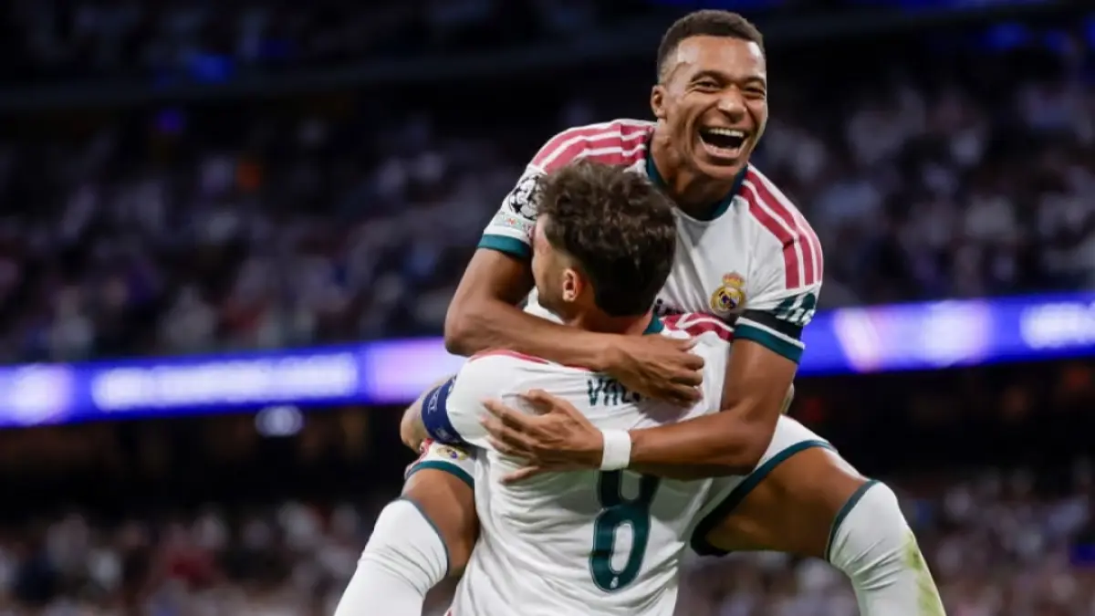 Kylian Mbappe dan Federico Valverde jadi bintang kemenangan Real Madrid. (The Guardian/Juanjo Martin/EPA) 