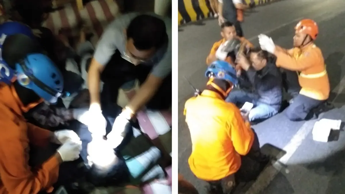 PENANGANAN: Petugas BPBD memberikan penanganan awal korban laka di Jalan Basuki Rahmat Surabaya, Kamis (10/9) dini hari.(IST/RADAR SURABAYA)
