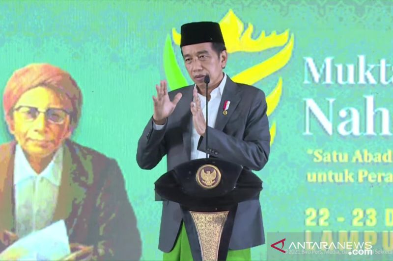 Presiden Jokowi menyampaikan sambutan saat membuka Muktamar Ke-34 Nahdlatul Ulama, di Gunung Sugih, Kabupaten Lampung Tengah, Lampung, Rabu (22/12/2021). (ANTARA)