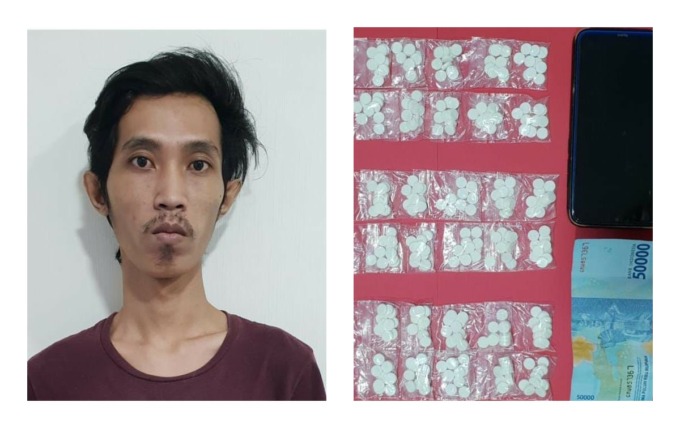PEMAIN LAMA: Tersangka NMS diamankan bersama barang bukti di Polres Pelabuhan Tanjung Perak. (IST)