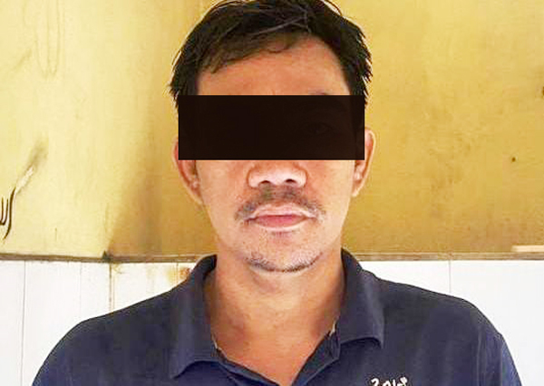 APES: Tersangka AS ditahan di Polsek Semampir. (ISTIMEWA)