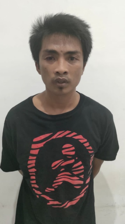 DITAHAN: M Faiz alias Faisol diamankan di Mapolsek Pakal, Surabaya. (IST)