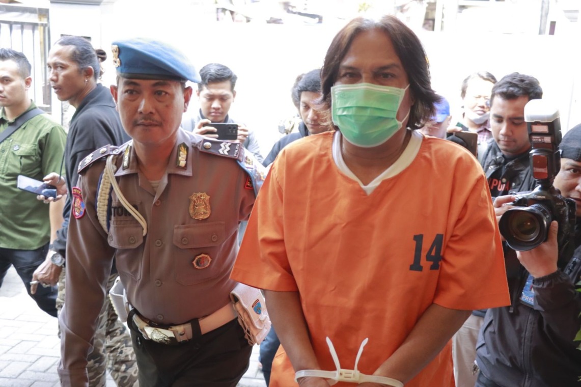 KUTU LONCAT: Tersangka Nanang diamankan di Polsek Asemrowo, Surabaya. (IST)