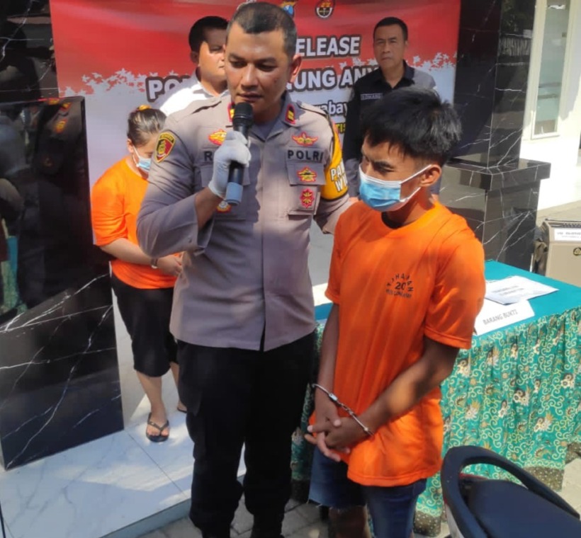 KAMBUHAN: Tersangka MIS dan penadah berinisial MJ (wanita) diamankan di Polsek Gunung Anyar.  (IST)