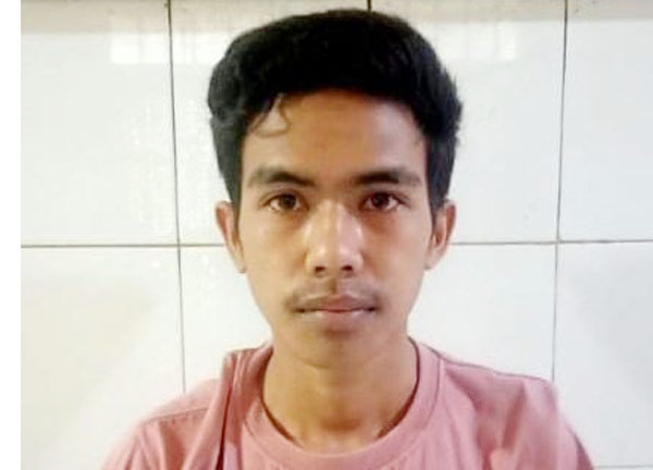 LICIK: Tersangka SLN ditahan di Polsek Kenjeran. (ISTIMEWA)