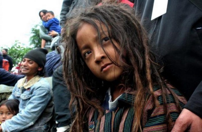 Anak berambut gimbal di dataran tinggi Dieng.