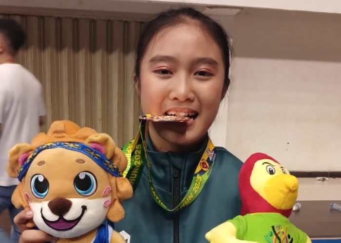 Kezia Nathania Setiawan sukses meraih medali perunggu di nomor Wushu Taolu.