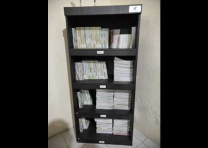 Rak buku bantuan dari perpusnas yang disiapkan untuk pojok baca desa Bangsongan, Kediri.