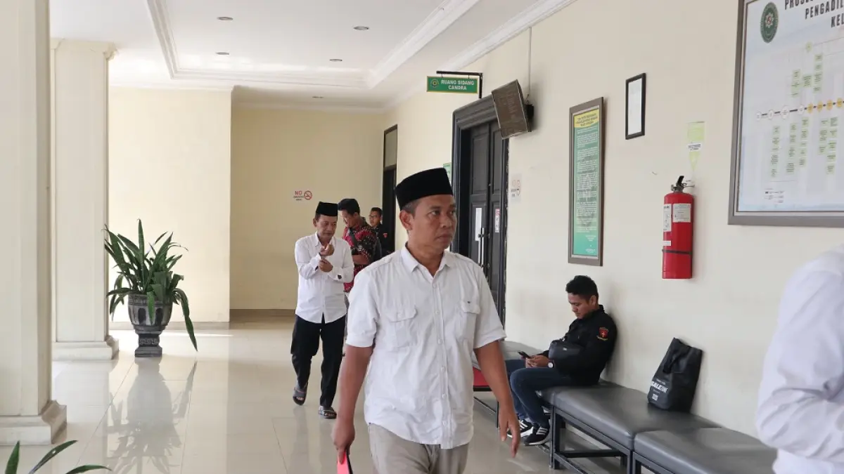 Sutrisno saat hendak lakukan sidang di PN Tipikor Surabaya. 
