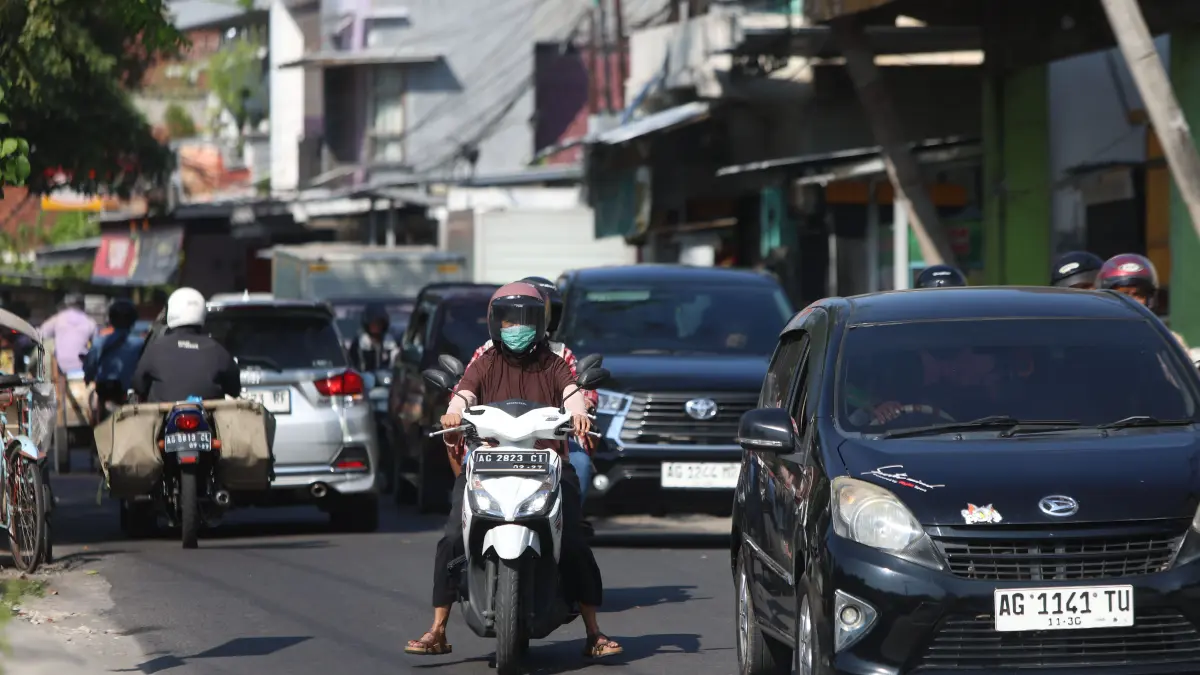 Ilustrasi pemotor nakal picu  kemacetan panjang di Jalan Tembus Kaliombo. (Wahyu Adji/JPRK)