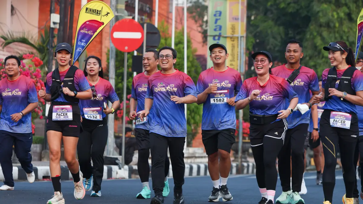 Yayat Cadarajat dan Ismirani Saputri turut berlari bersama 1.500 peserta Syiar QRIS Run 2026.