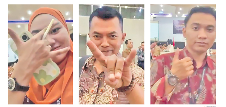 VIRAL: Tangkapan layar sebuah video yang memperlihatkan pose jari yang seolah menunjukkan dukungan capres. Ini dilakukan oleh penyelenggara pemilu di Jember.