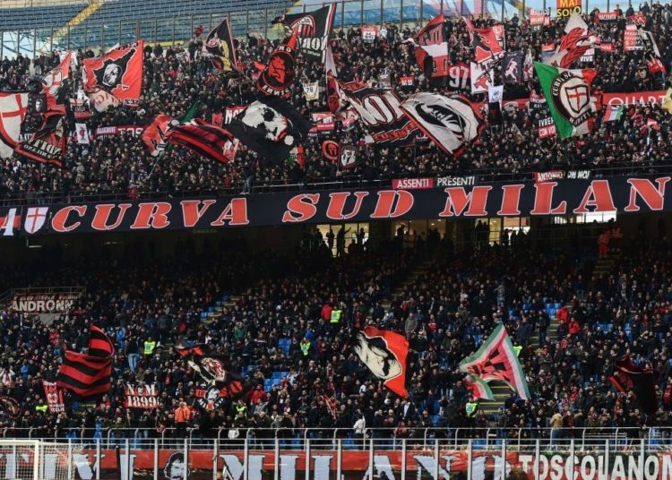 AC Milan fans of the Curva Sud section cheer prior to the Italian Serie A football match AC Milan vs Verona on February 2, 2020 at the San Siro stadium in Milan. (Photo by Miguel MEDINA / AFP) (Photo by MIGUEL MEDINA/AFP via Getty Images)