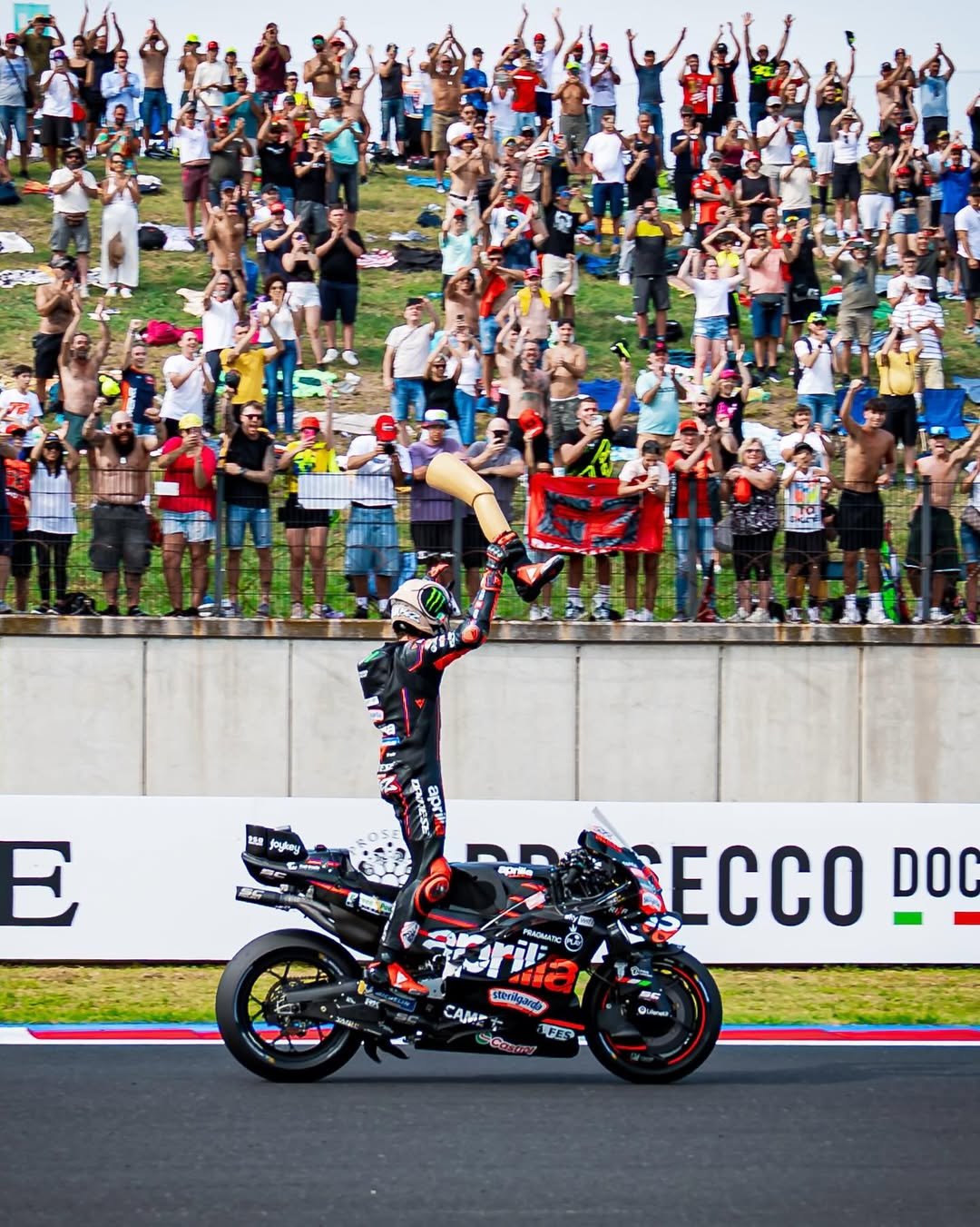 Selebrasi Marco Bezzecchi setelah memenangi Sprint Race MotoGP San Marino, Italia.