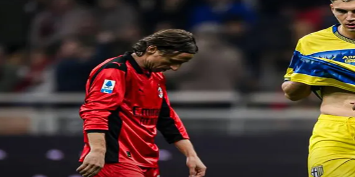 Luka Modric tertunduk lesu usai AC Milan kalah 0-1 dari Parma