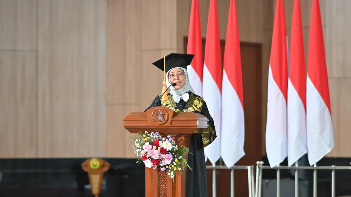 Laporan Direktur Universitas Terbuka Jember, Dra. Barokah Widuroyekti, M.Pd