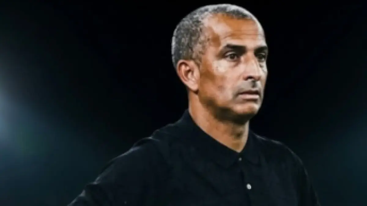 pelatih kepala Sabri Lamouchi