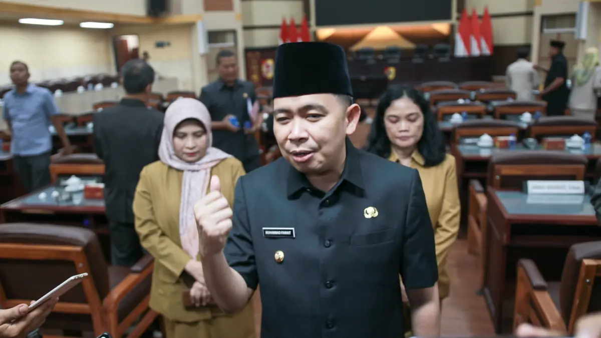 "Kalau nggak rukun eksekutif dan legislatif, susah dapat WTP. Maka saya terima kasih, dan mohon bantuan DPRD, bagaimana kita menjaga itu bahkan membuat tahun 2026 bisa lebih baik."
MUHAMMAD FAWAIT, Bupati Jember. (Diskominfo Jember)