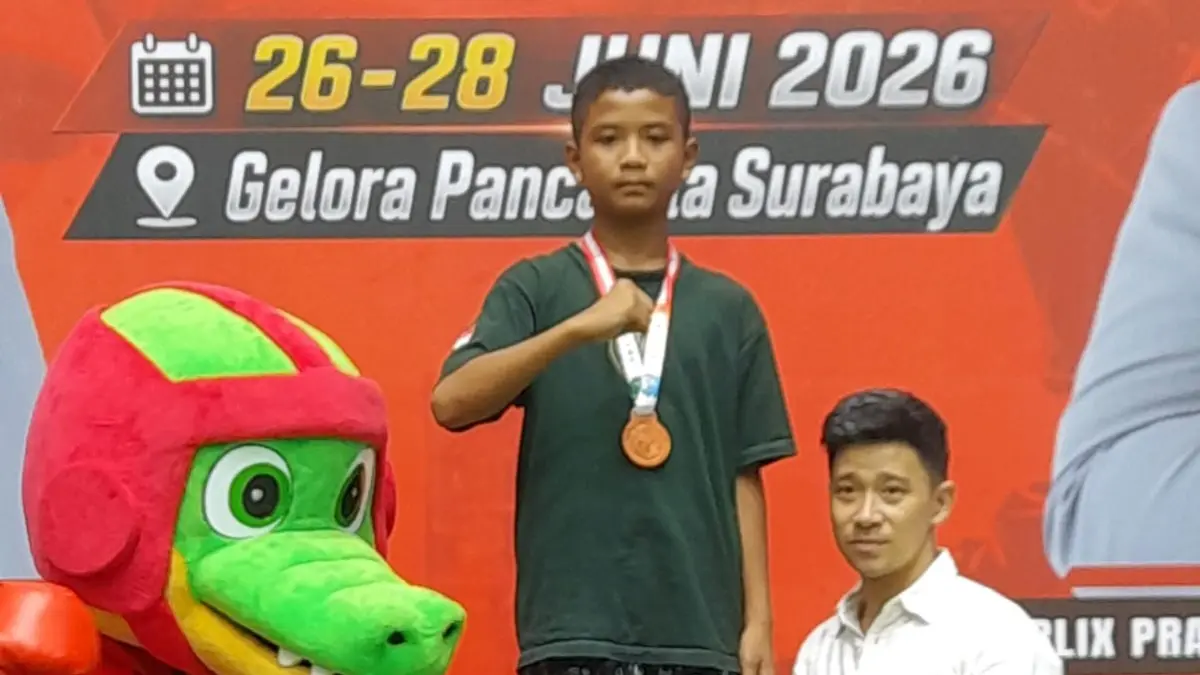 JUARA:&nbsp;Bilal Maulana, petinju asal Arjasa Jember dinyatakan sebagai Juara 1 dalam Kejuaraan Tinju Piala Wali Kota Surabaya, akhir pekan lalu. (ONE DONY PRAYOGA)