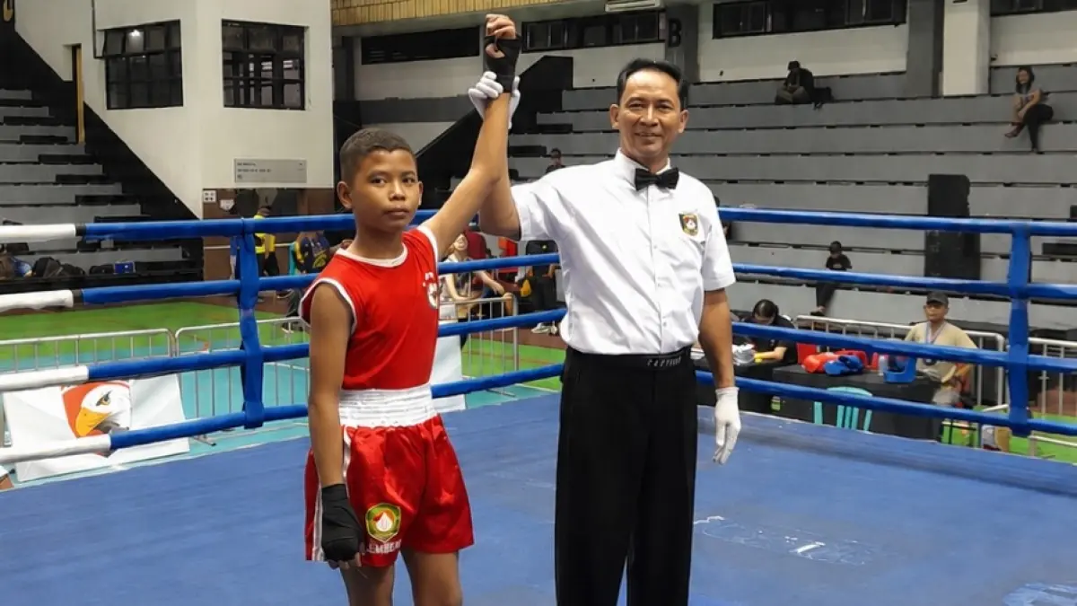 JUARA:&nbsp;Bilal Maulana, petinju asal Arjasa Jember dinyatakan sebagai Juara 1 dalam Kejuaraan Tinju Piala Wali Kota Surabaya, akhir pekan lalu. (ONE DONY PRAYOGA)