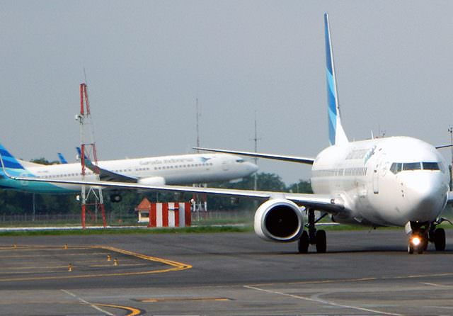ILUSTRASI: Pesawat Garuda Indonesia di Bandara Internasional Juanda, Sidoarjo. (Frizal/Jawa Pos)