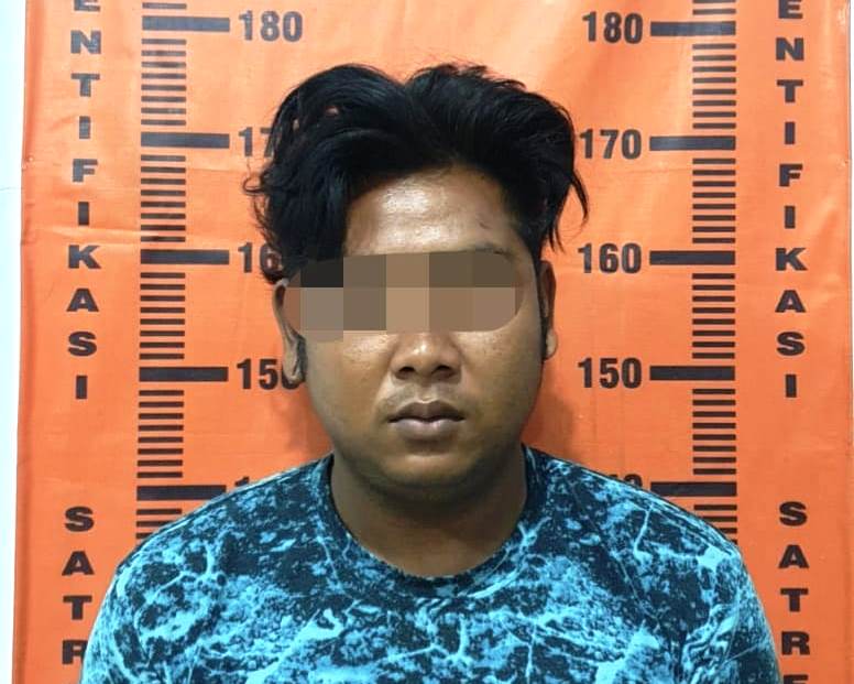 TERTANGKAP: RN, pelaku penganiayaan terhadap anak di bawah umur. Kini, pelaku telah mendekam di tahanan Polsek Jenggawah.