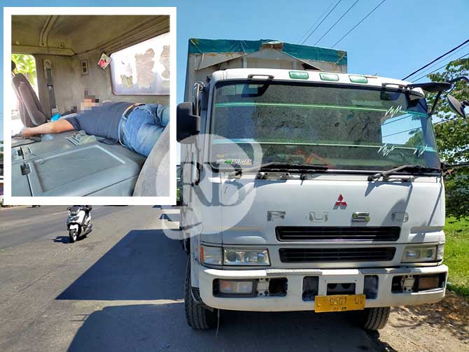 Caption: Kondisi truk saat parkir di tepi jalan selama 2 hari terakhir di Carat, Gempol, Pasuruan, Jawa Timur, sang sopir kemudian ditemukan meninggal di dalam kabin truk lantas kejadian itu dilaporkan ke polisi.