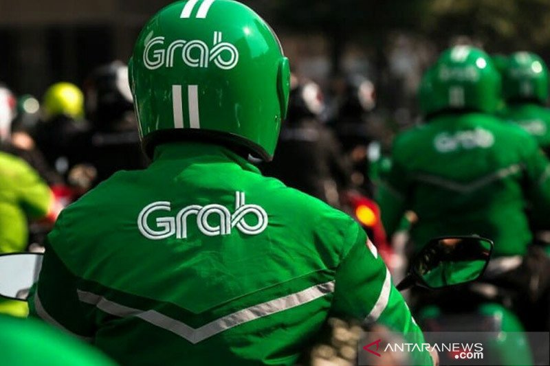 Caption Foto :  Pengendara Ojok Online Grab.