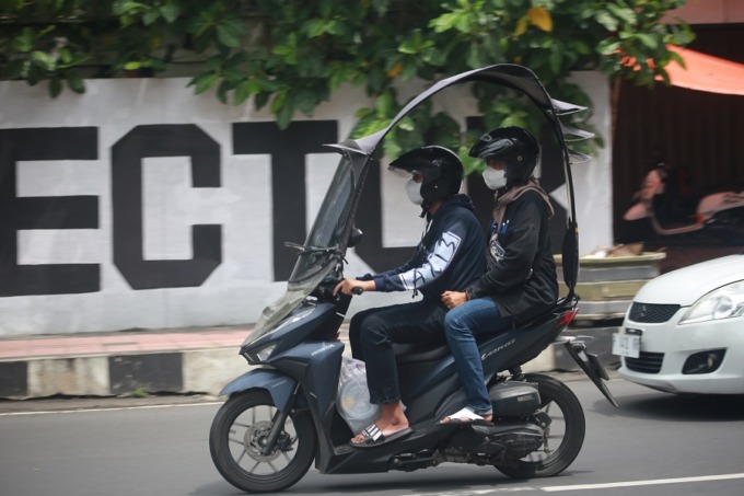 DILARANG: Modifikasi sepeda motor menggunakan tambahan kanopi dilarang.