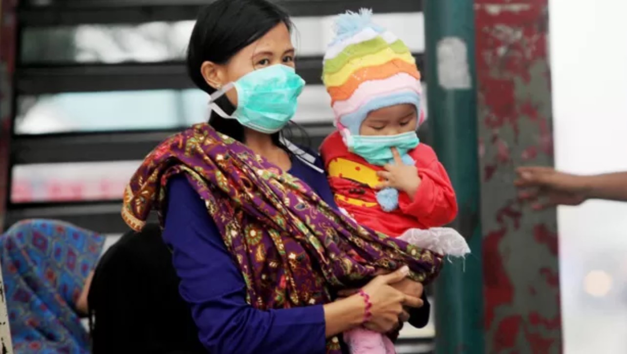 Ilustrasi anak pakai masker (JAWAPOS.COM)