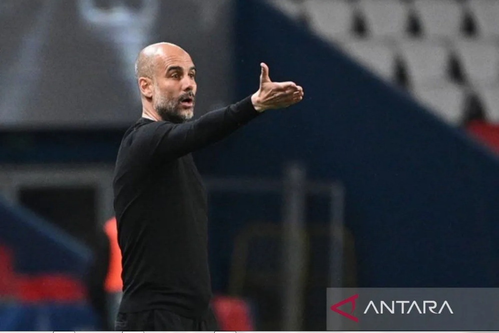 Pelatih Manchester City asal Spanyol Pep Guardiola. ANTARA/AFP/ANNE-CHRISTINE POUJOULAT/pri.