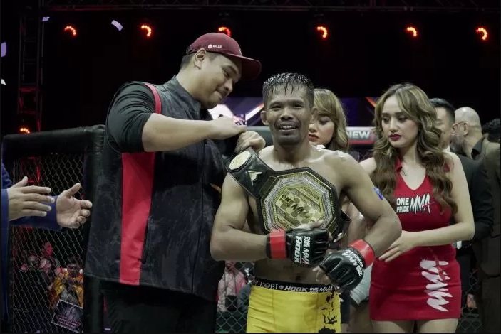 Petarung asal Magetan, Suwardi mempertahankan gelar juara untuk kedua kali di One Pride MMA 72 setelah menaklukkan Aditya Ginting lewat keputusan juri. (Istimewa)