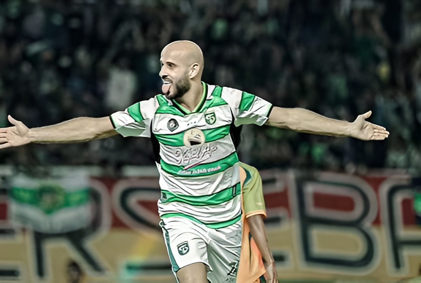 Selebrasi Mohammed Rashid usai mencetak gol.