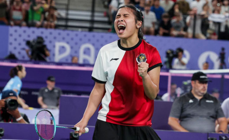 Gregoria Mariska saat bertanding di olimpiade lalu.