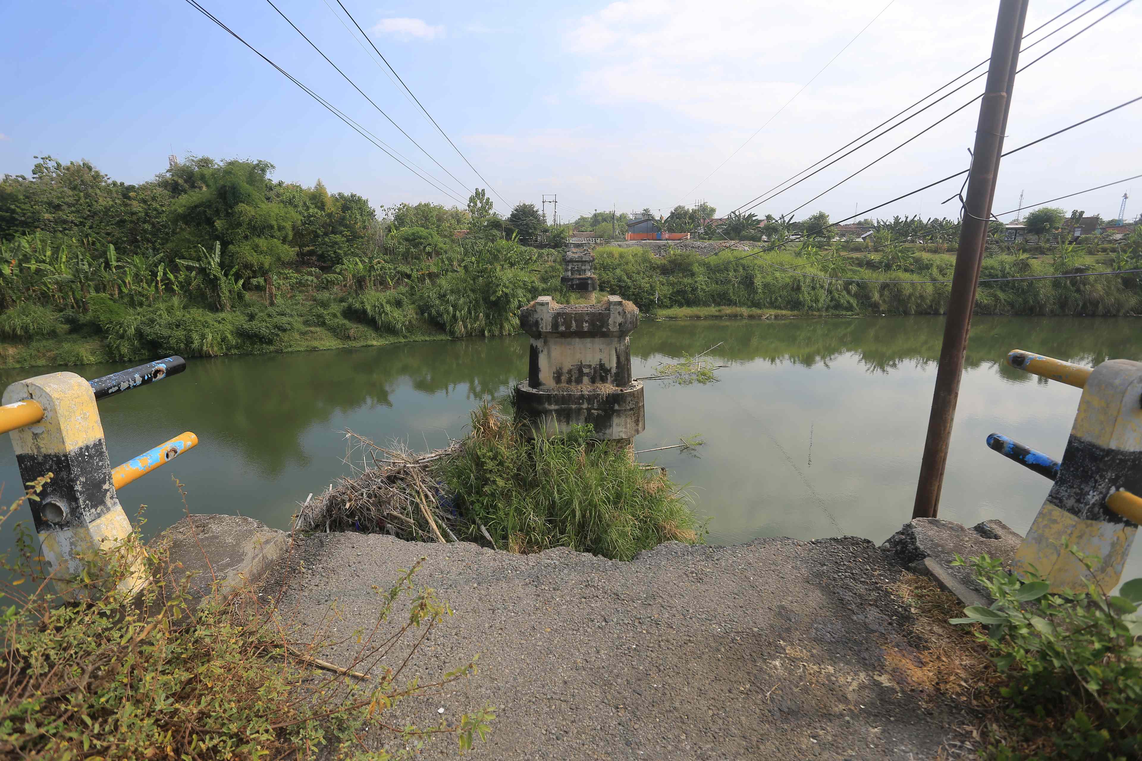 MODEL GANTUNG: Pembangunan Jembatan Patihan segera menyentuh pekerjaan fisik. (BAGAS BIMANTARA/RADAR MADIUN)