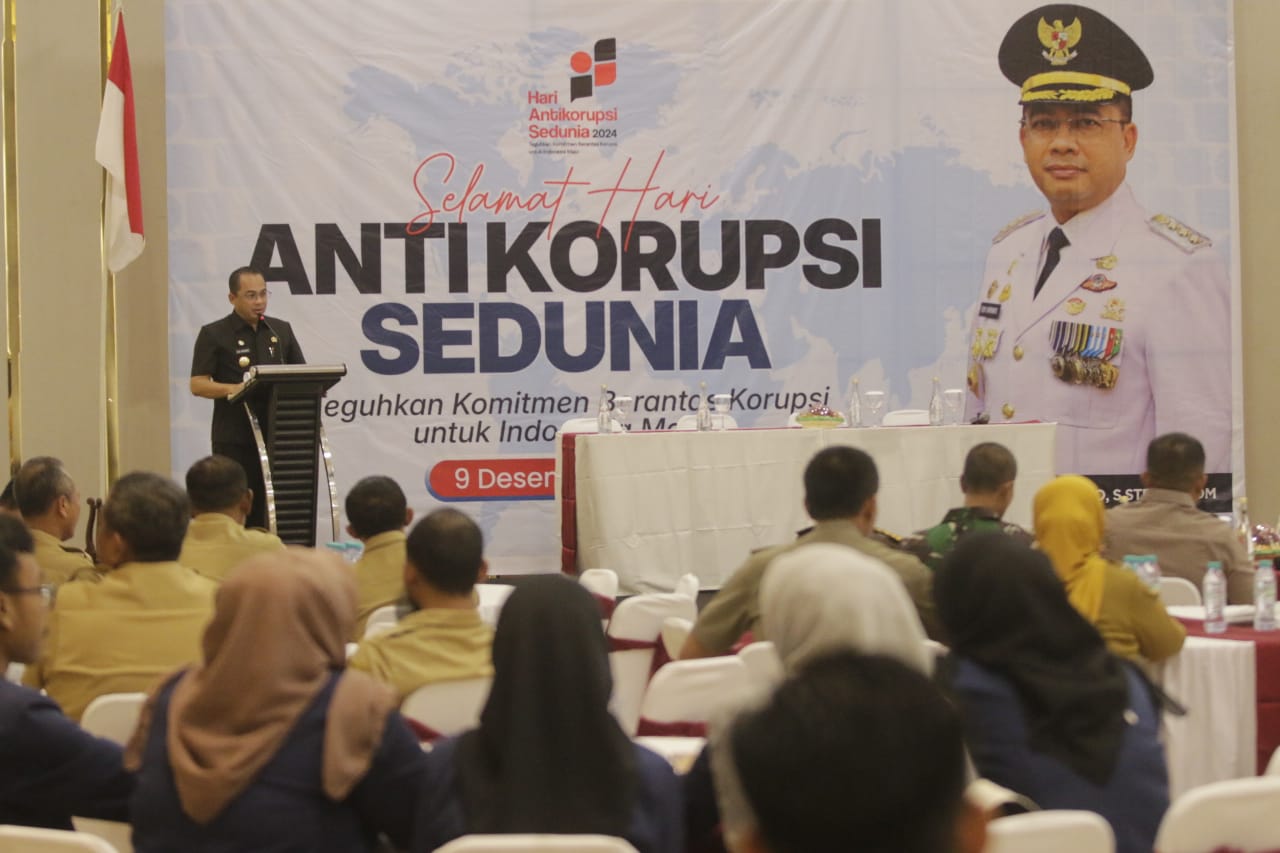SOSIALISASI: Pemkot Madiun menggelar acara peringatan Hakordia 2024 di Nawasena Garden Resto & Ballroom Kota Madiun,&nbsp;Senin (9/12). (BAGAS BIMANTARA/JAWA POS RADAR MADIUN)