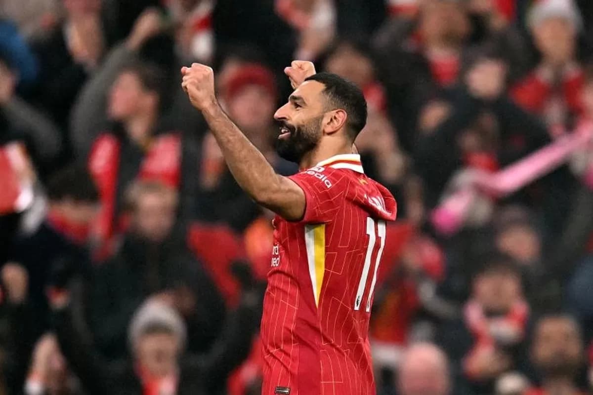 Penyerang Liverpool Mohamed Salah merayakan golnya.