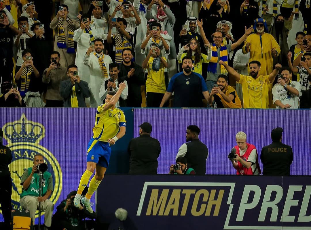 Cristiano Ronaldo merayakan gol yang membawa Al Nassr melaju ke perempat final Liga Champions Asia.