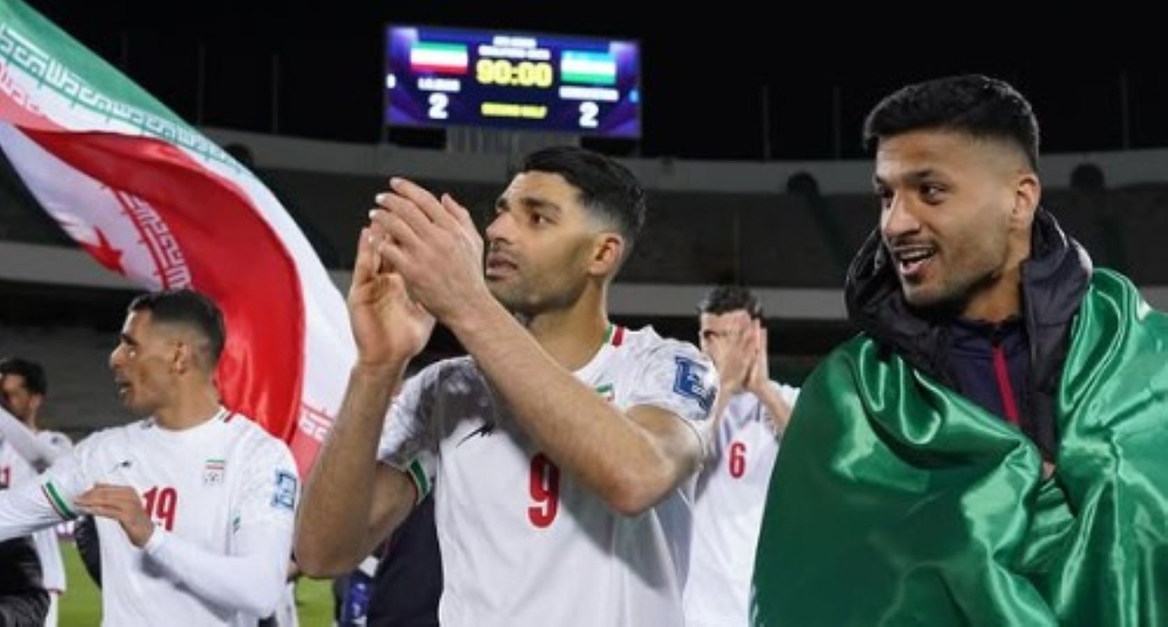 Striker Iran Mehdi Taremi merayakan lolosnya negara mereka ke Piala Dunia 2026.