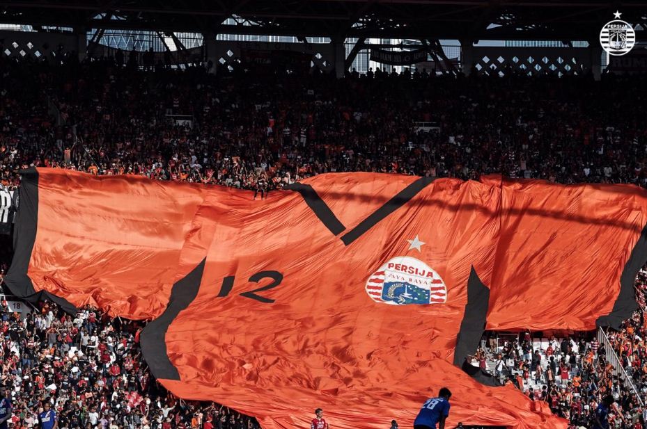 Aksi Jakmania mendukung Persija di salah satu laga Liga 1.
